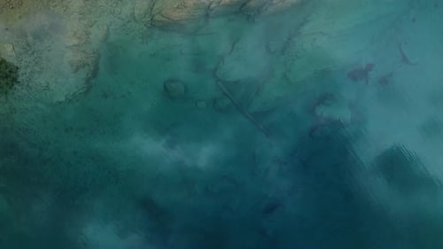 This Aerial View Captures a Tranquil Water Surface Perfect for Relaxation and Meditation