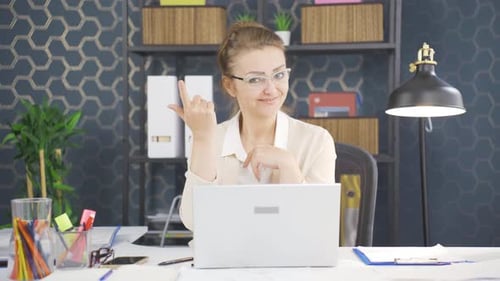 Business Woman at Computer in Modern Office
