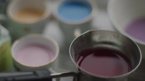 Painters desk with paint pots