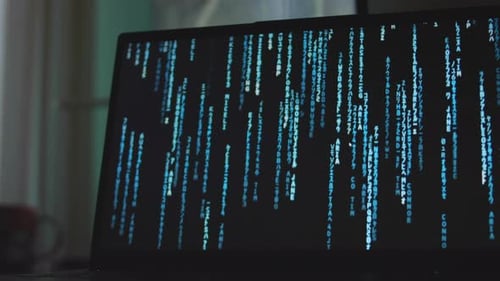 Matrix Background with Falling Blue Digital Code Rain on Laptop Screen