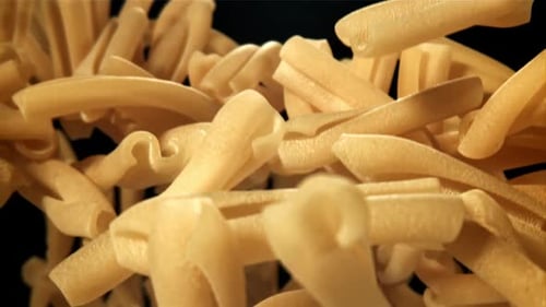 Pasta Casarecce Flies Up and Falls Down Filmed on a Highspeed Camera at 1000 Fps