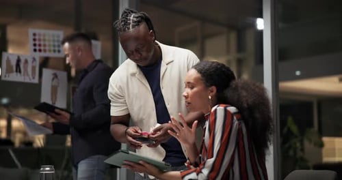 Business people, tablet and planning for design at night in office, creative agency