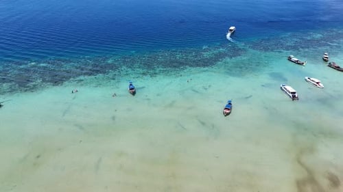 Aerial View of Boats on Clear Blue Waters in Thailand