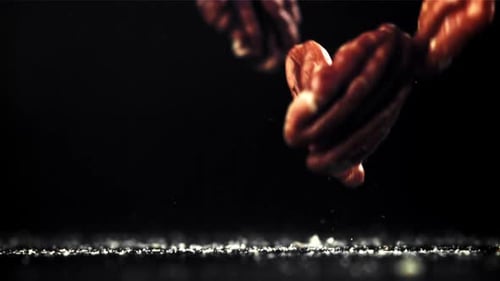 Pecans Fall on the Table Filmed on a Highspeed Camera at 1000 Fps