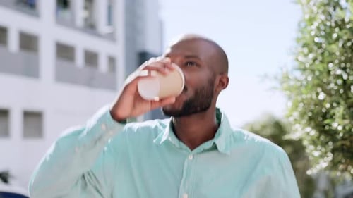 Happy, morning and black man drinking coffee in the city during a commute and walking in Australia