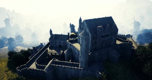 Imposing Medieval Castle Surrounded By Mist and Windmills at Dawn