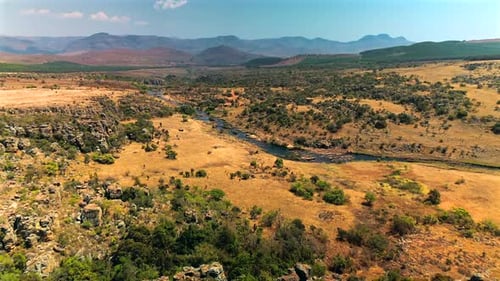 NAMIBIA: Aerial View of a Desert River Meandering Through Arid Landscape