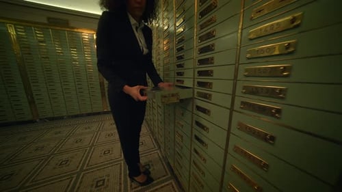 Sales Team Having a Serious Matter of Conversation Inside the Vault Room