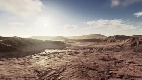 Vista aérea de la puesta de sol sobre las dunas de arena en el desierto