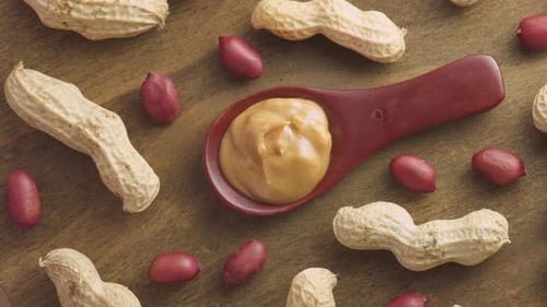 Creamy Peanut Butter Surrounded by Whole Peanuts