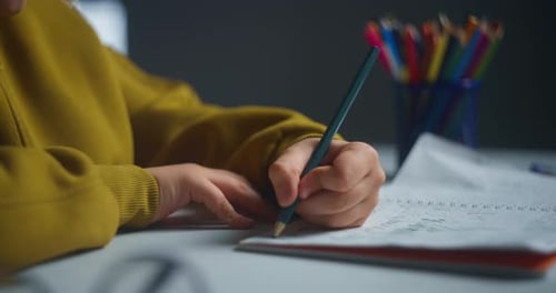 Child Studies Quietly Young Learner Engaged In Educational Work During Peaceful Evening Session