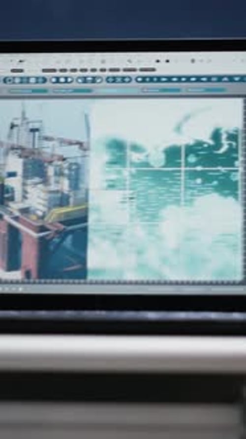 Vertikaler Videolaptop-Bildschirm zeigt Visualisierungsüberwachungssoftware auf einer leeren Offshore-Plattform