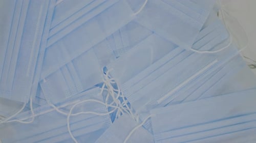 Top View White Sterile Medical Masks Rotation Closeup