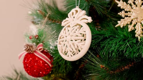 Festive Christmas Ornaments on Tree Branches