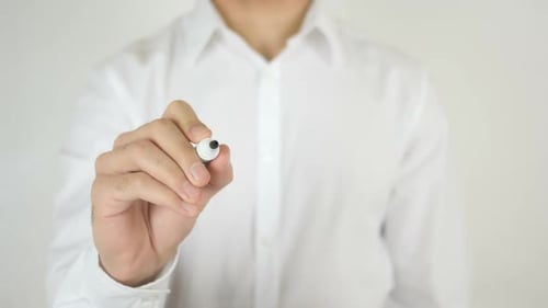 Man Writes Tips with Marker on Glass