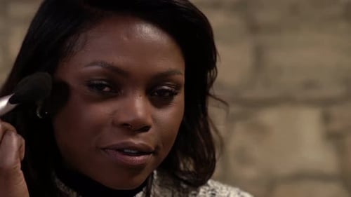 Handheld close up American woman powdering face, makeup.