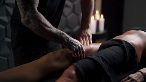 Man Receives a Relaxing Leg Massage
