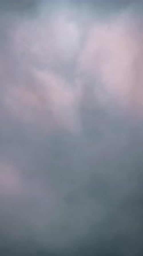 Heavenly White, Pink and Blue Clouds Seamless Looping Vertical Backdrop.