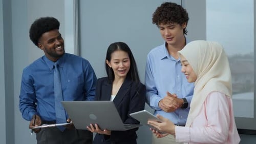 Diverse Colleagues Brainstorming Ideas in Modern Office