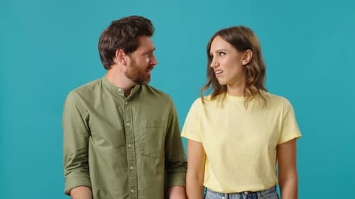 Couple Give Thumbs Down of Disapproval