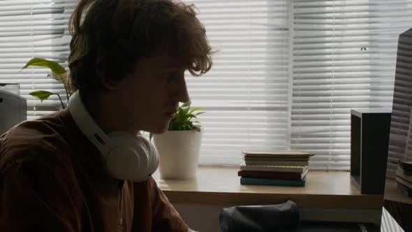 Gen Z Male Programmer Coding on Computer during Workday in Office ...
