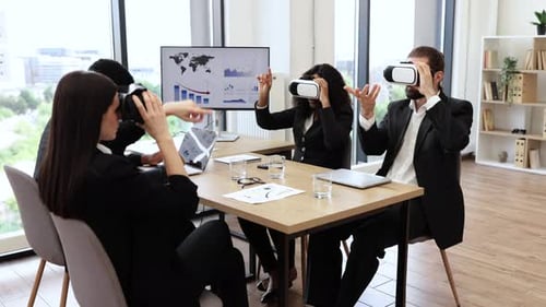 Business Team Using Virtual Reality Headsets at Office Meeting