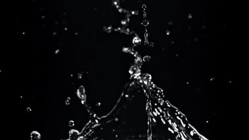 Water splash on black background in slow motion