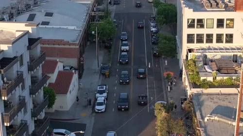 Aerial View of Arts District, Downtown Los Angeles USA, Street Traffic and Buildings at Sunset, Pull