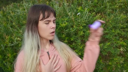 Teenager with Asthma in Garden