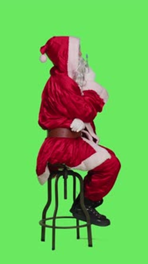 Vertical Video Profile of Character in Red Costume Sit on Chair