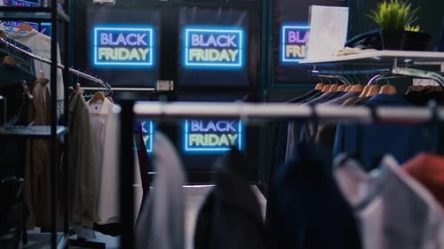 Clothing Store with Black Friday Signs on Doors