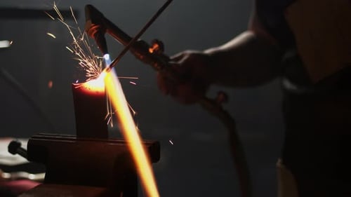 Welding Torch Melts Metal With Fiery Sparks