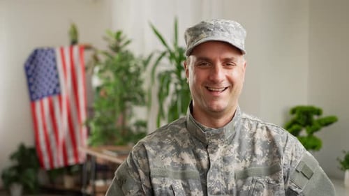Smiling Man in Military Uniform Thumbs Up Indoors