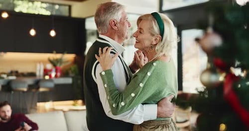 Senior Couple Dancing Together at Home for Christmas