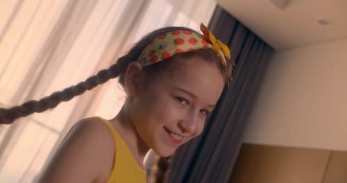 Portrait Funny Little Girl with Two Braided Pigtails Smiling Child Looking at the Camera Cute Baby