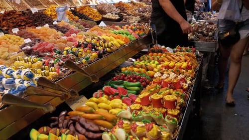 Showcase of Colorful Sweets in La Boqueria Market Barcelona Spain