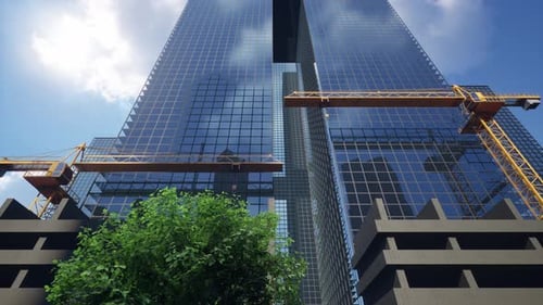 Edificio de gran altura con una grúa amarilla