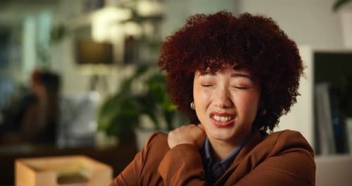 Night, business and woman in office with neck pain, overworked and muscle fatigue with stress