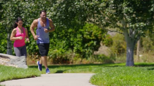 Couple Running at Park Active