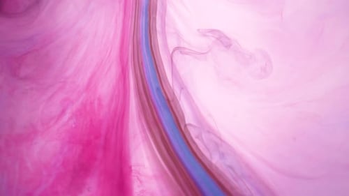 multicolor abstract background based on pink, blue and black paint on water, 4k macro view copy spac