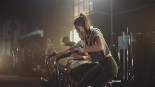 Intense bicycle workout at the gym