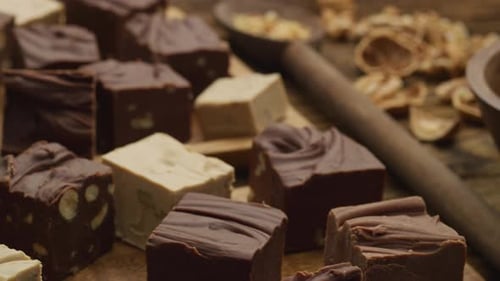 Variety of Handmade Chocolate Fudge on Wooden Tray