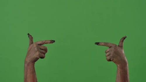 Creepy Zombie Hands Point to the Workspace