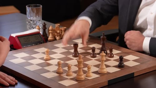 Chess Game Between Two Adults Indoors