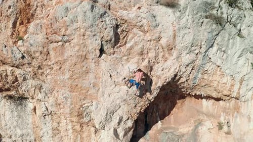 Rock climber climbing the rock 1