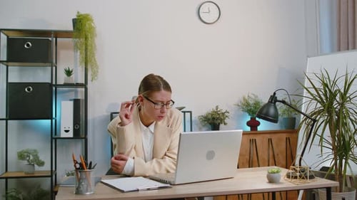 Businesswoman Freelancer Enters Office Workplace Working on Laptop Computer Sends Online Messages