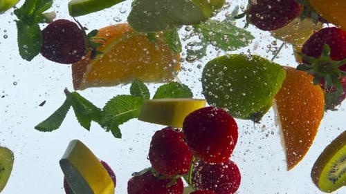 Floating Fresh Fruits Underwater in Super Slow Motion Close Up