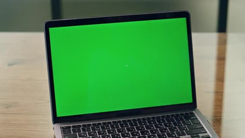 Lady Using Greenscreen Laptop in Office Close Up. Anonymous Business Woman Working