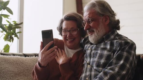 Senior Couple Enjoying a Video Call at Home