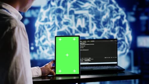 AI Script Coding on Green Screen Tablet